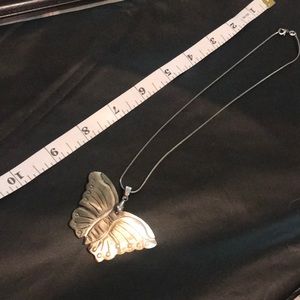 Handmade Abalone Shell Butterfly pendant necklace on silver chain.